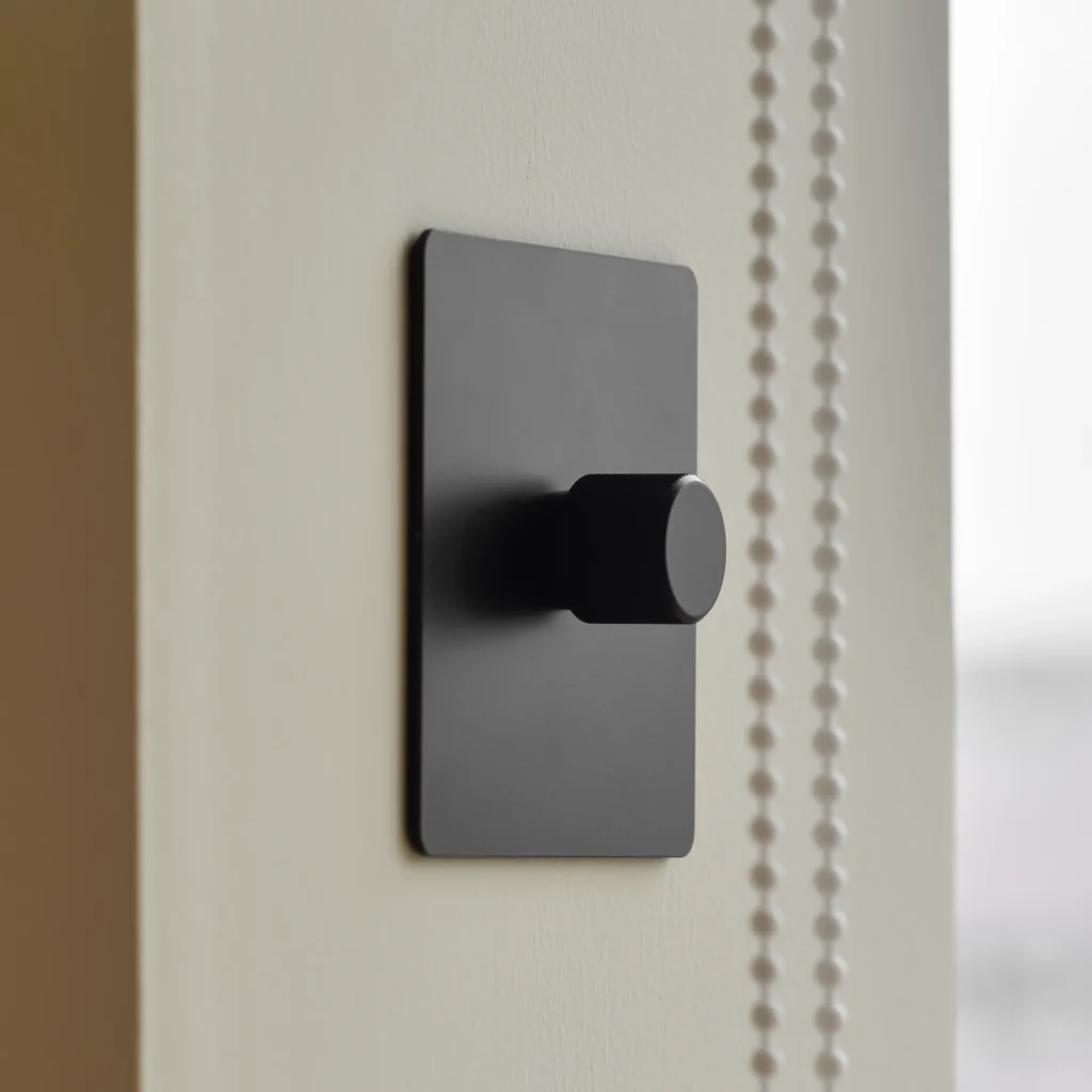 solid black steel dimmer switch